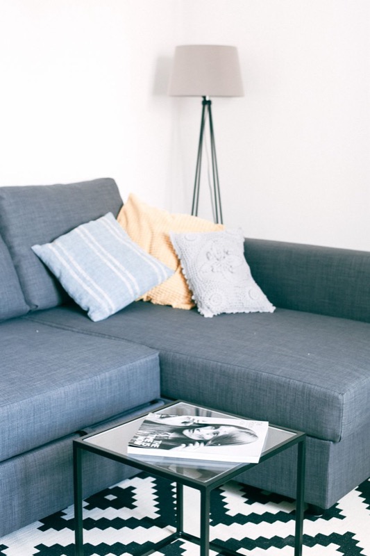 Photo from a blog post about cozy small living rooms used to make the pins