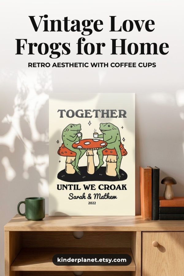 AI product scene Pinterest pin: the same frog couple print on a wooden sideboard with books and a green mug